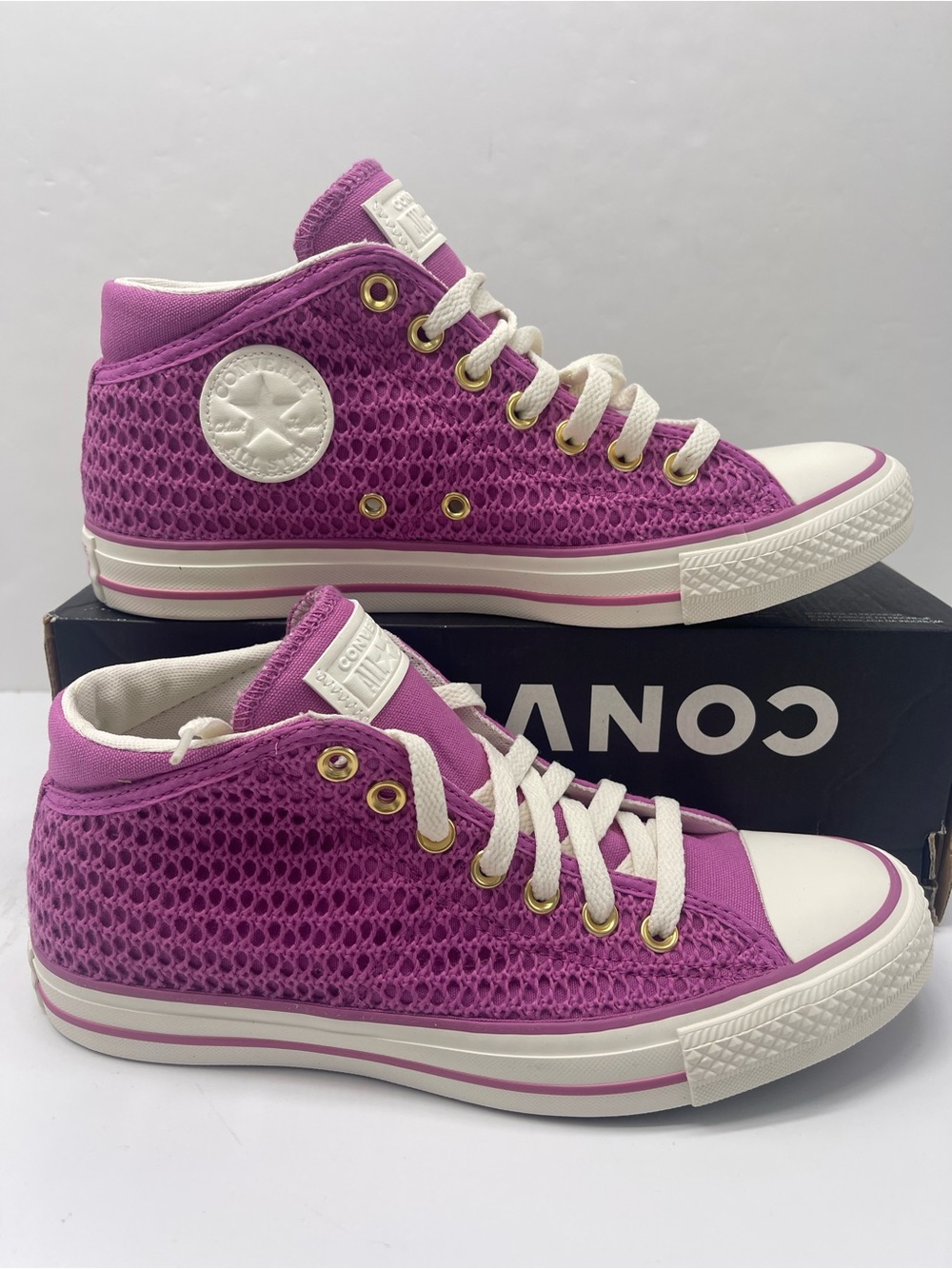 Converse Womenβs Purple Mesh High Top Sneakers with White Accents